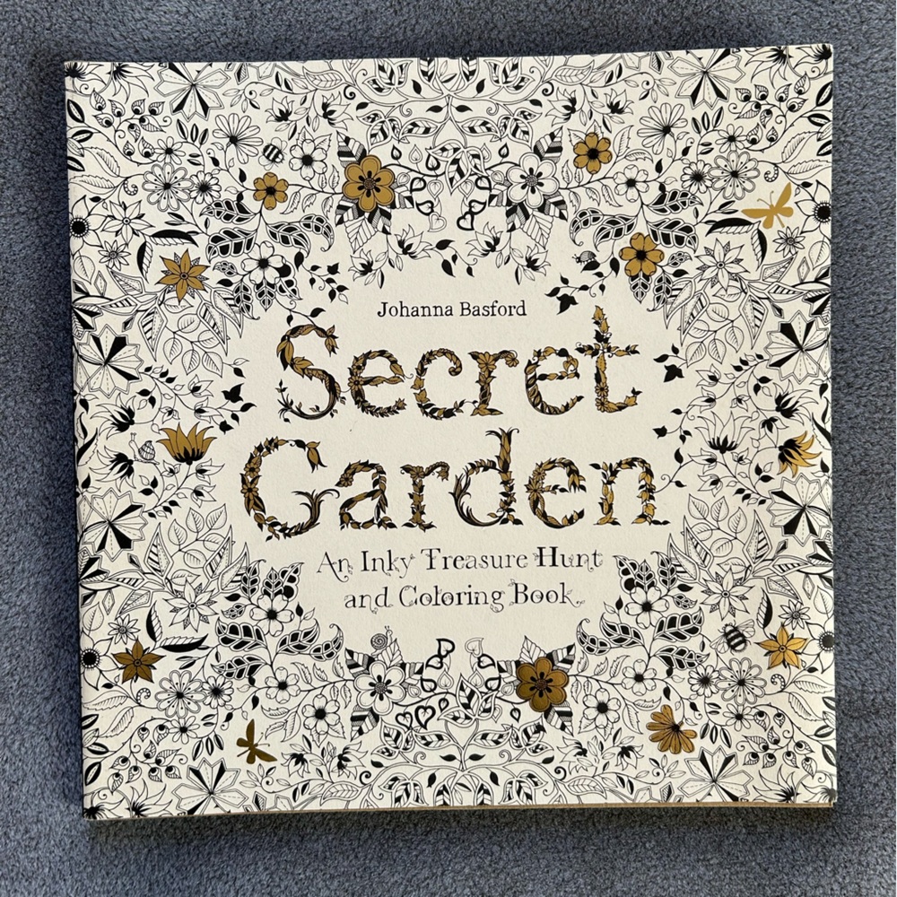 Secret Garden: An Inky Treasure Hunt and Coloring Book for Adults